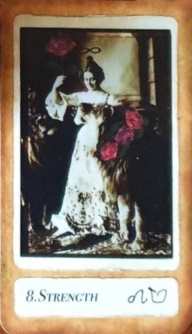 Strength from the Antiquarian Tarot deck