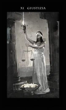 Justice card from the Darkness of Light Tarot deck