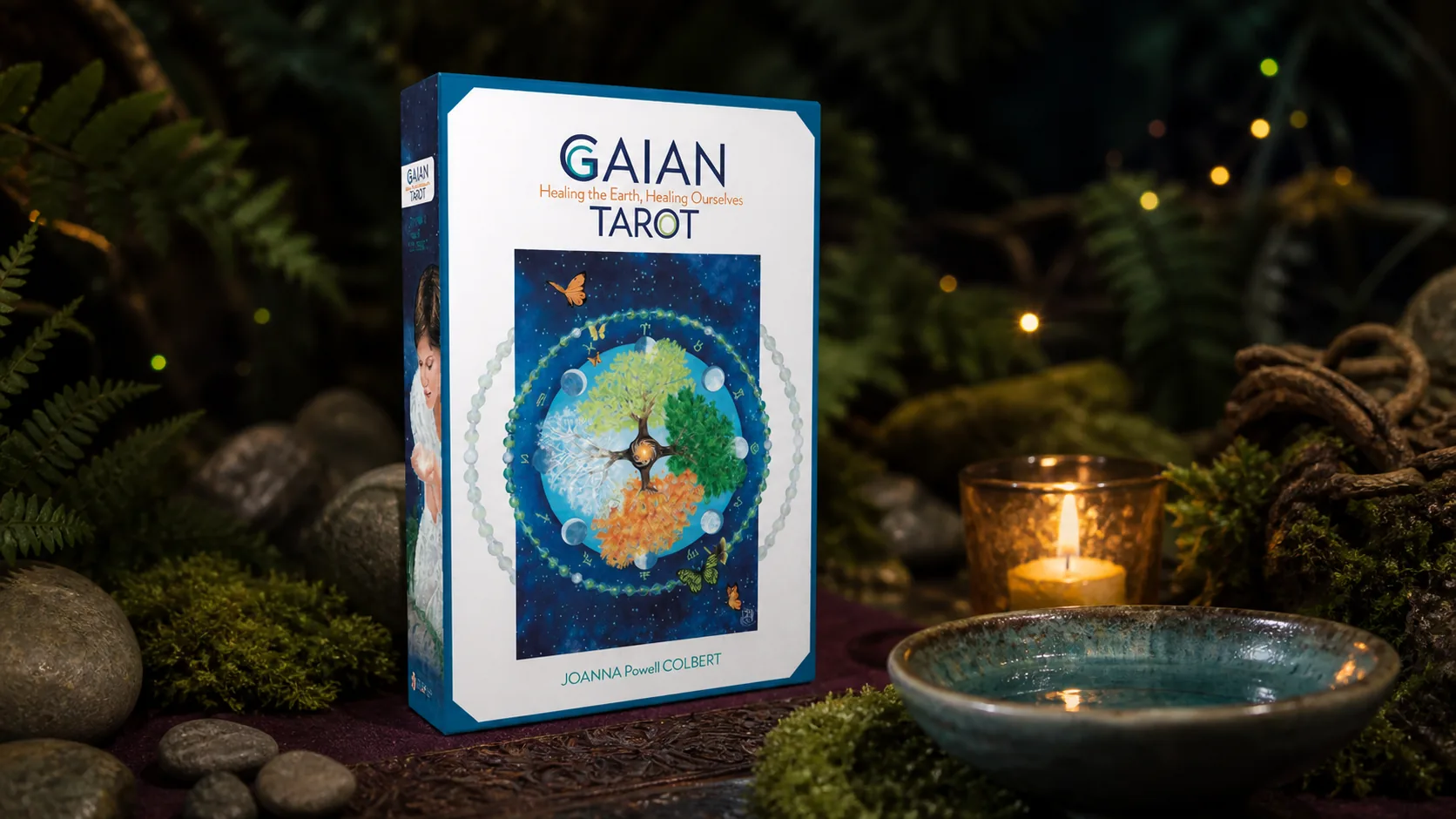 Gaian Tarot Deck by Joanna Powell Colbert in a mossy woodland altar setting