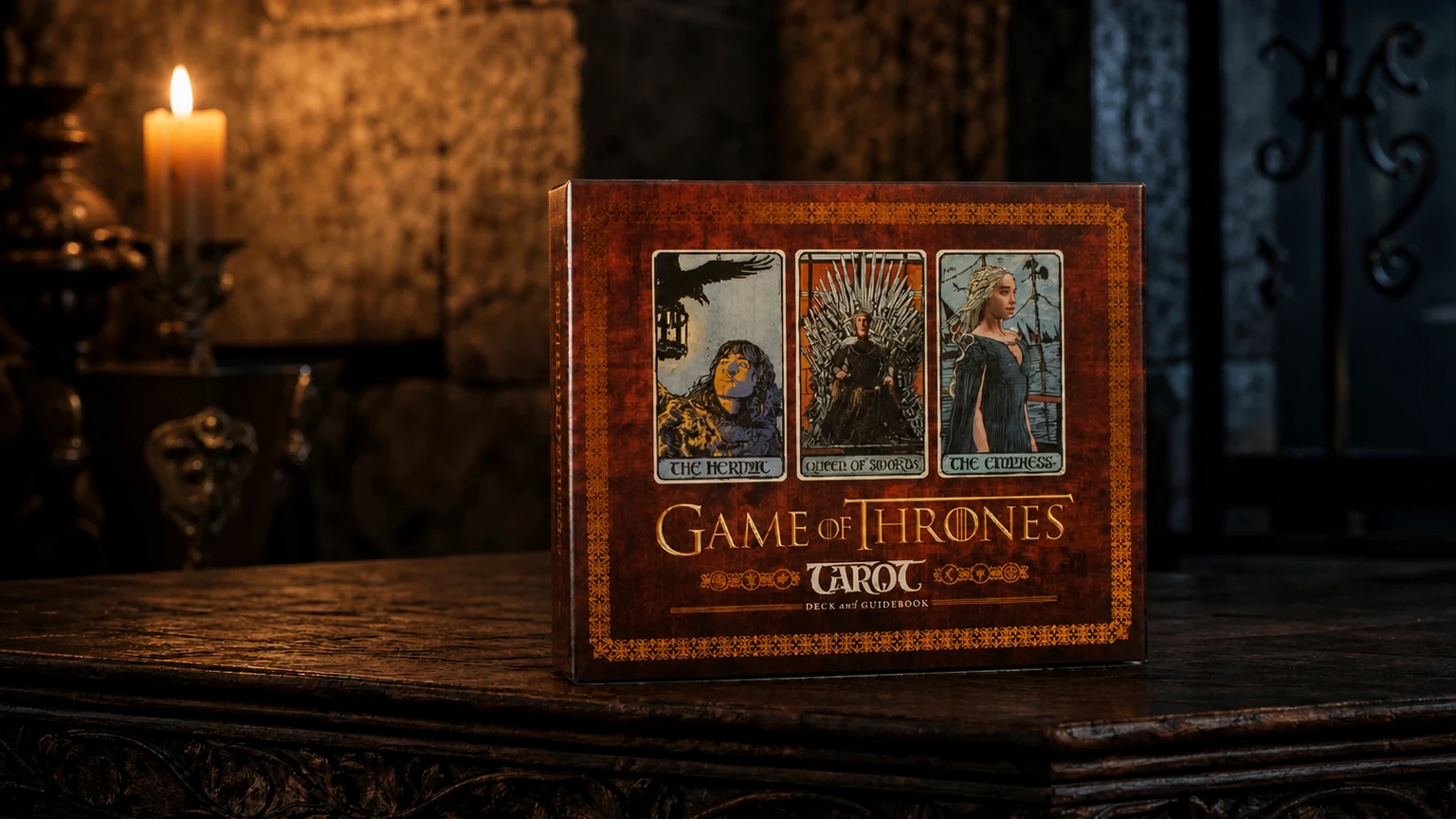 Game Of Thrones Tarot Deck by Liz Dean on a candlelit carved table