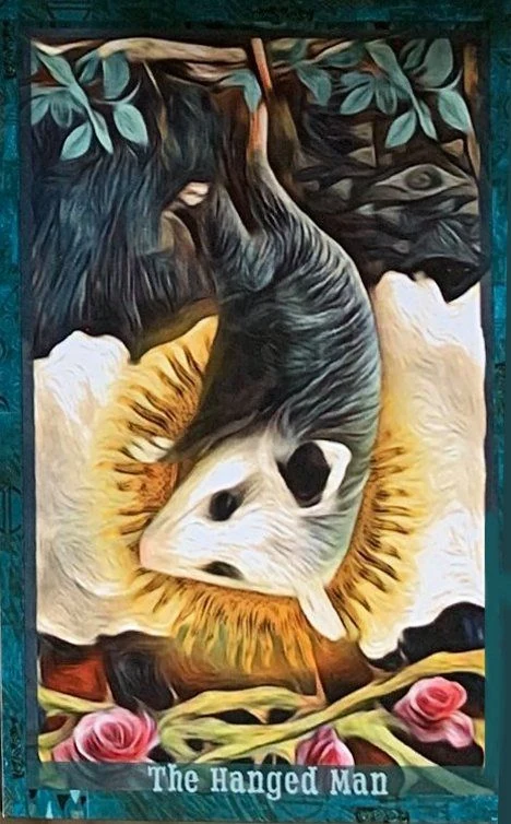 The Hanged Man card from the Guardian of the Night Tarot deck