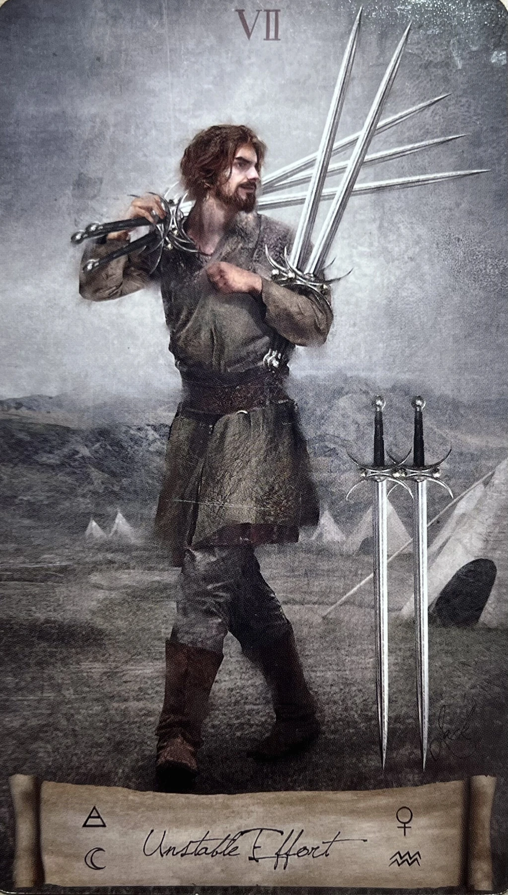 Seven of Swords card from the Heaven and Earth Tarot deck