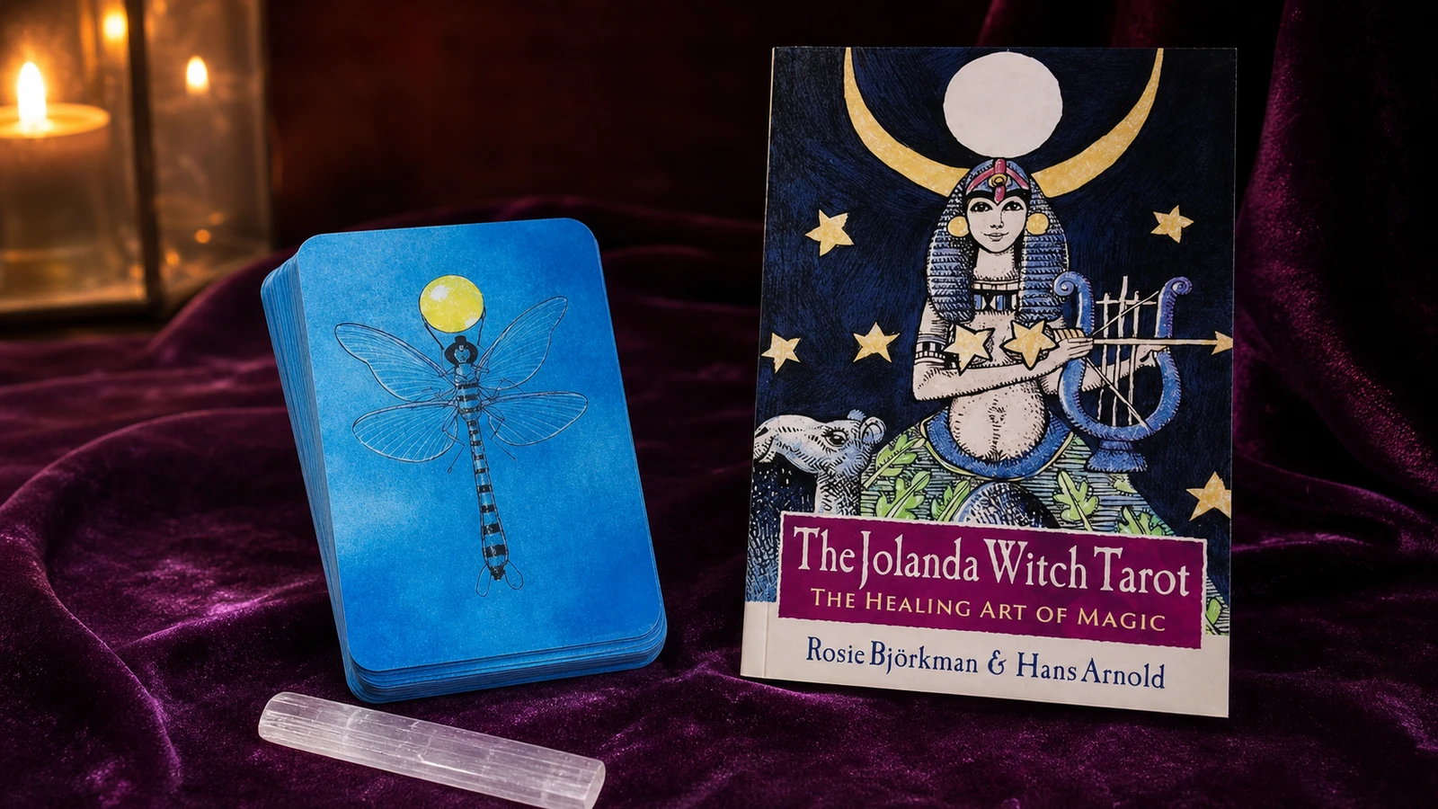 Jolanda Tarot box on plum velvet with candlelight and clear quartz