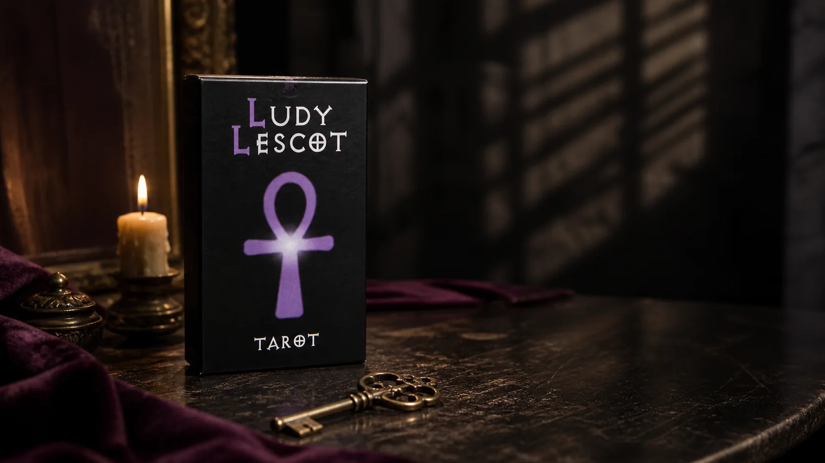 Ludy Lescot Tarot box with lavender ankh on a candlelit Victorian reading desk