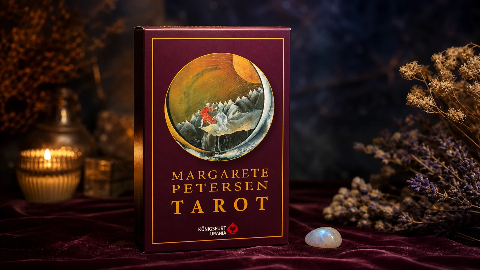 Margarete Petersen Tarot anniversary edition on a dark velvet tarot table