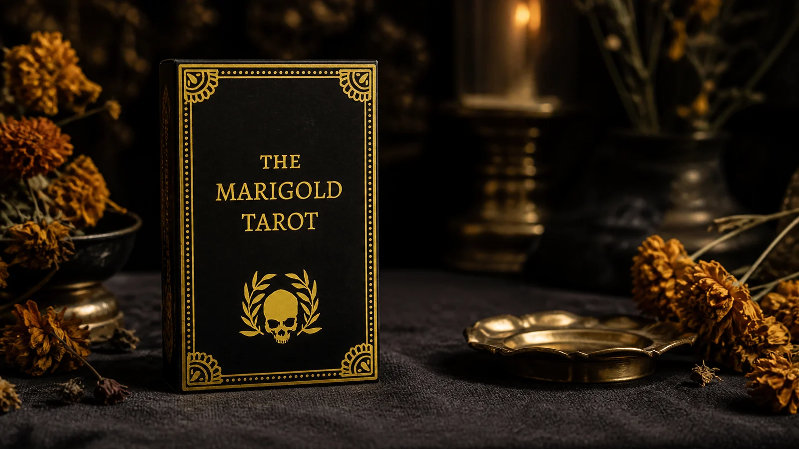 Marigold Tarot Review 16 The Marigold Tarot Classic box in a black-and-gold botanical reading setting