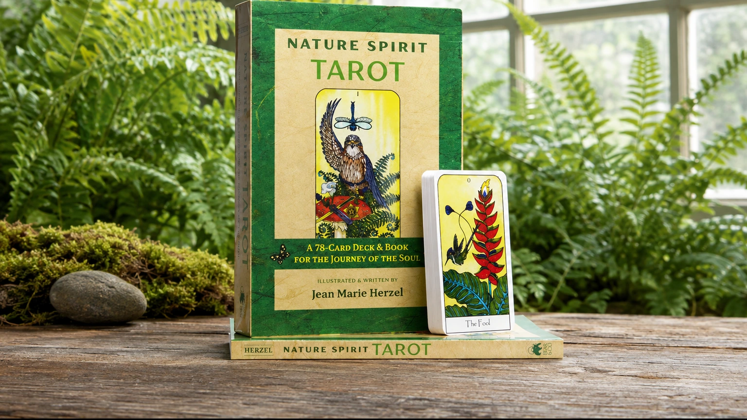 Nature Spirit Tarot boxed deck by Jean Marie Herzel in a bright fern-filled conservatory