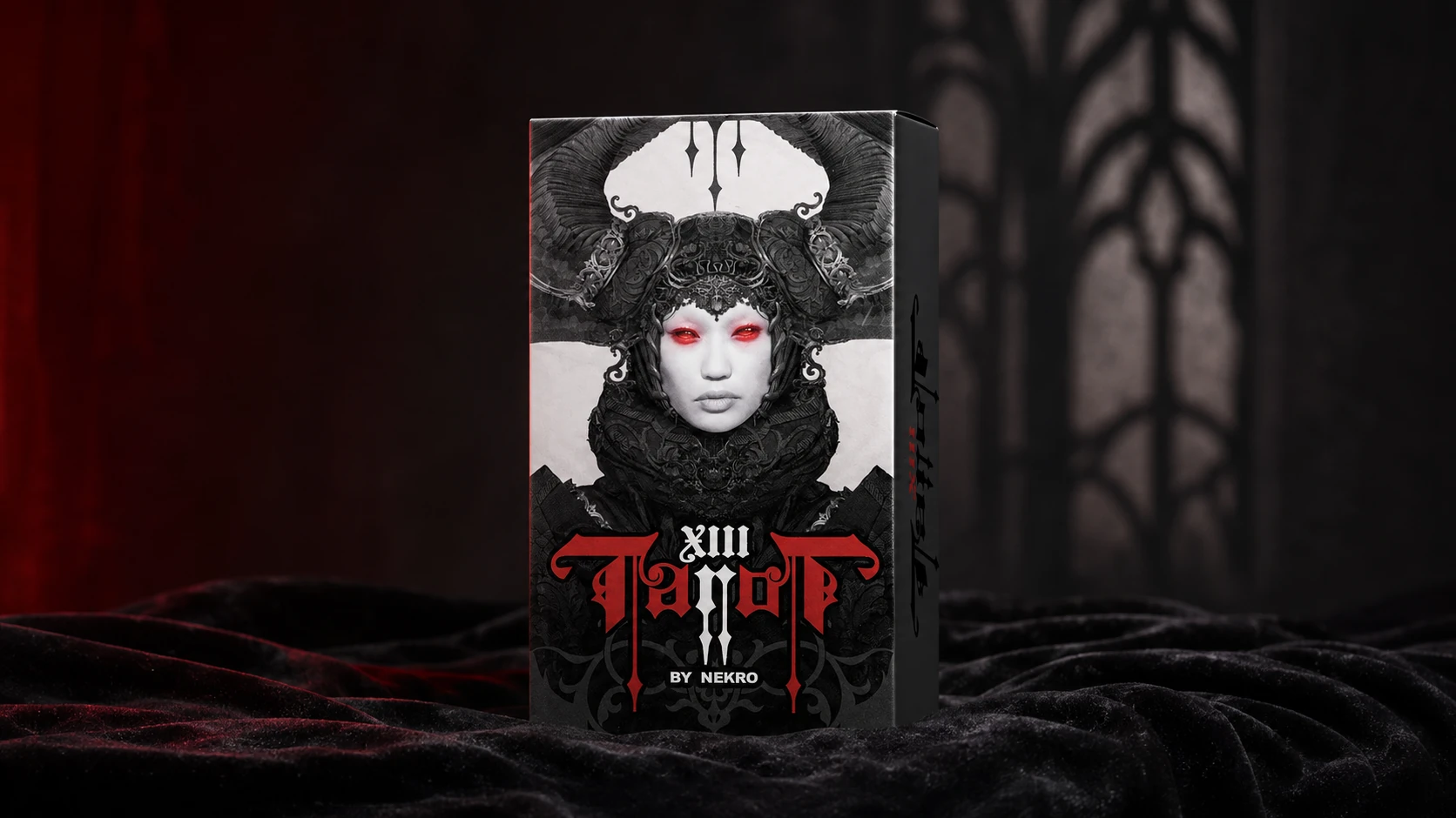 XIII Tarot by Nekro deck box on black velvet with red light