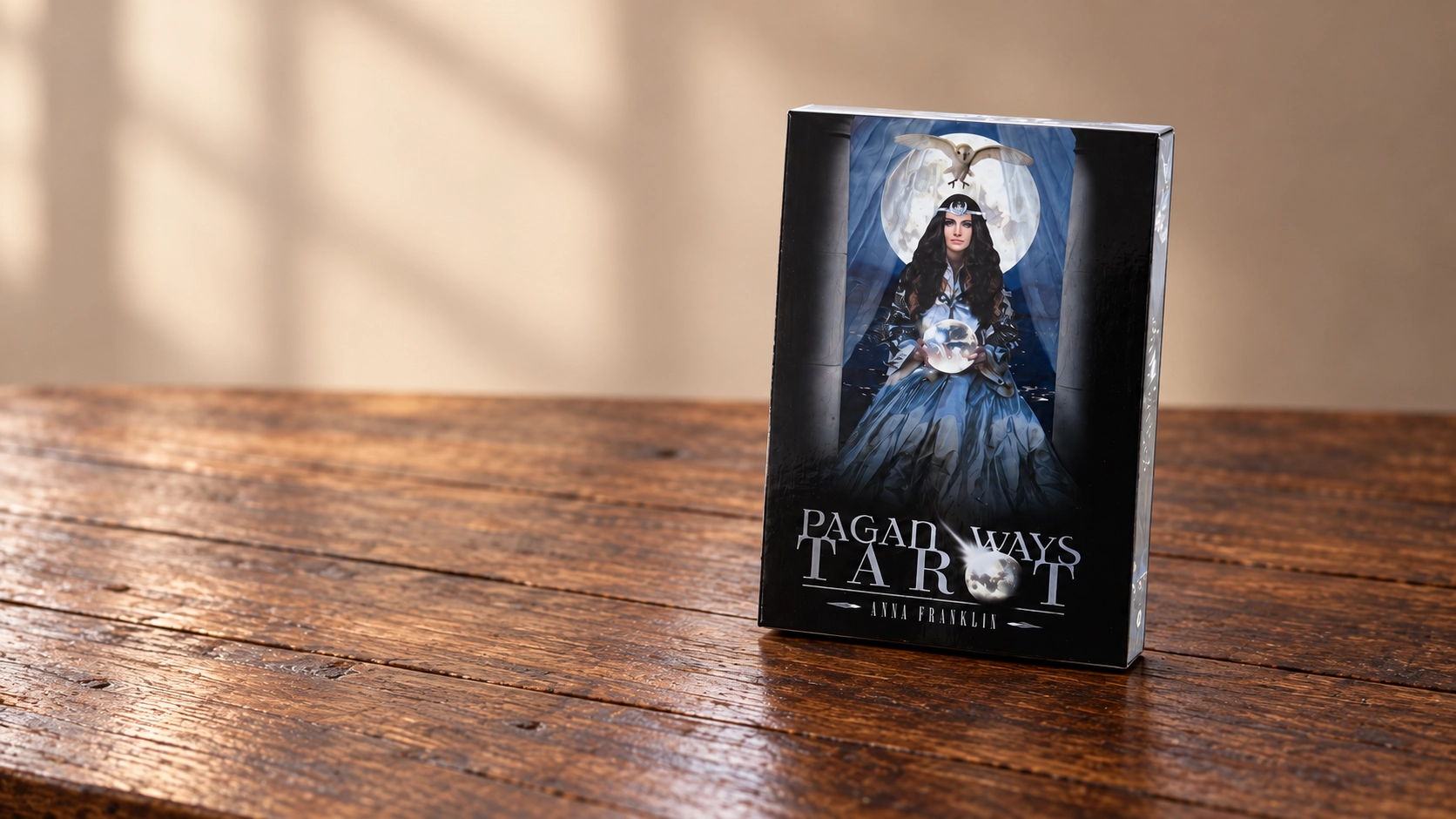 Pagan Ways Tarot Review (All 78 Pagan Ways Tarot Cards REVEALED!) 104 AI-generated editorial scene of the Pagan Ways Tarot box by Anna Franklin on a simple wooden table.