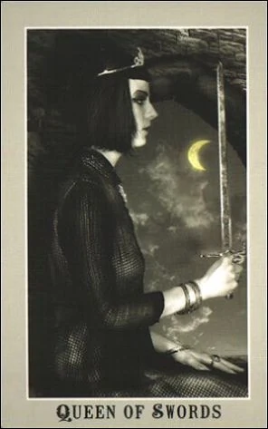 Queen of Swords card from the Silver Era Tarot deck