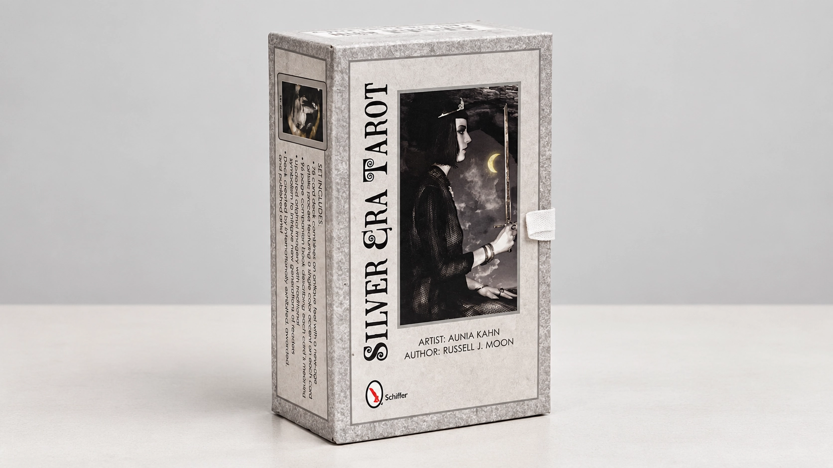 Generated scene of one upright Silver Era Tarot Deck box by Aunia Kahn and Russell J. Moon on a simple neutral table