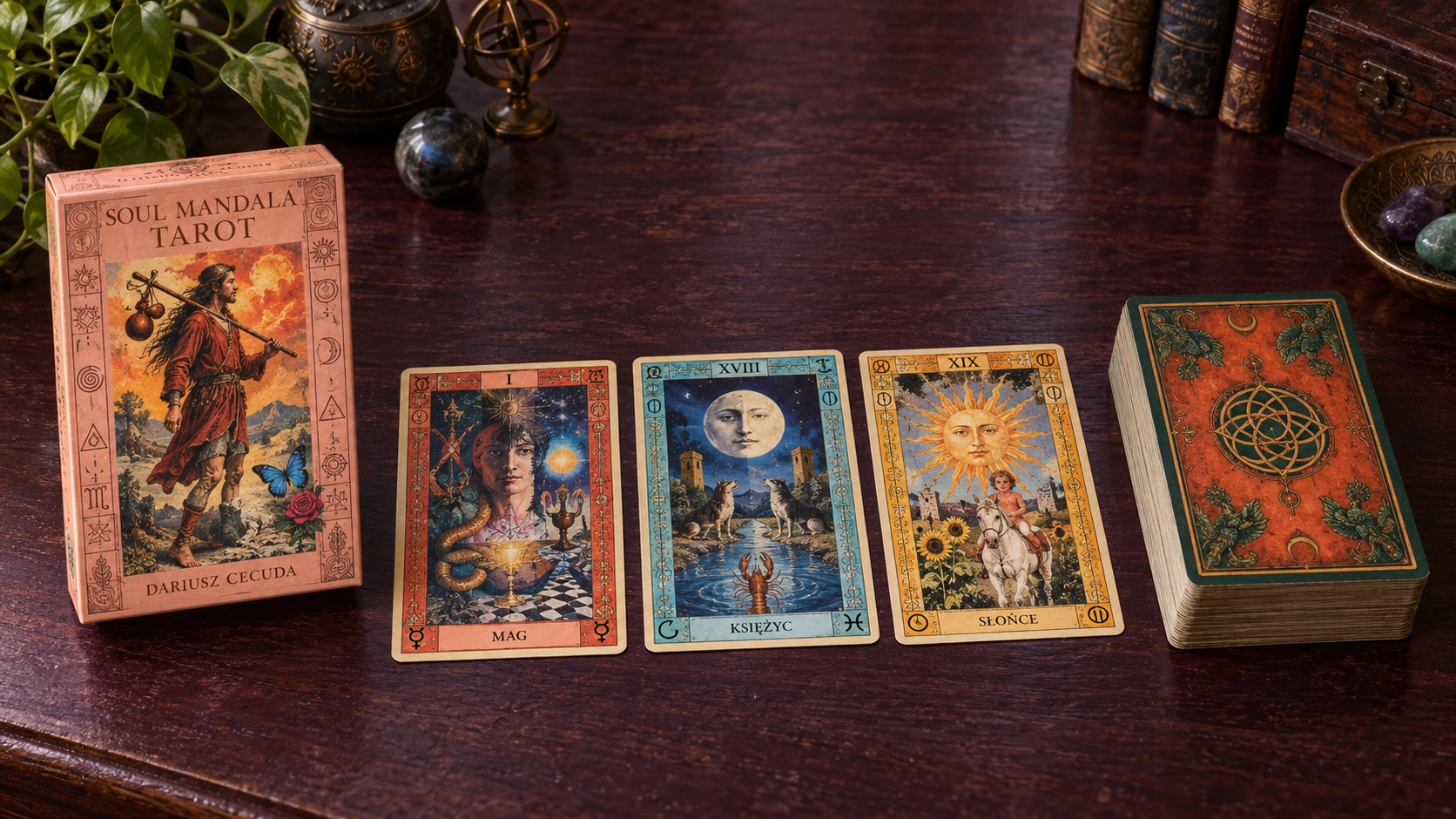 Generated editorial scene of the Soul Mandala Tarot deck box by Dariusz Cecuda with three face-up cards and the orange mandala-backed stack