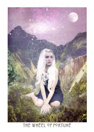 The Wheel of Fortune card from The Starchild Tarot Akashic by Danielle Noel