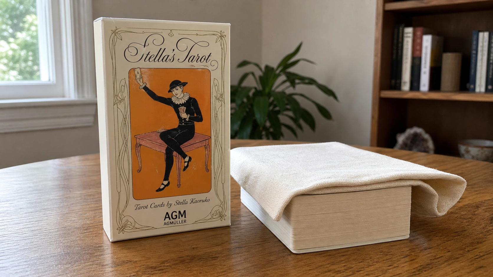 Generated home reading scene with the recognizable Stella Tarot deck box by Stella Kaoruko and a separate covered card stack