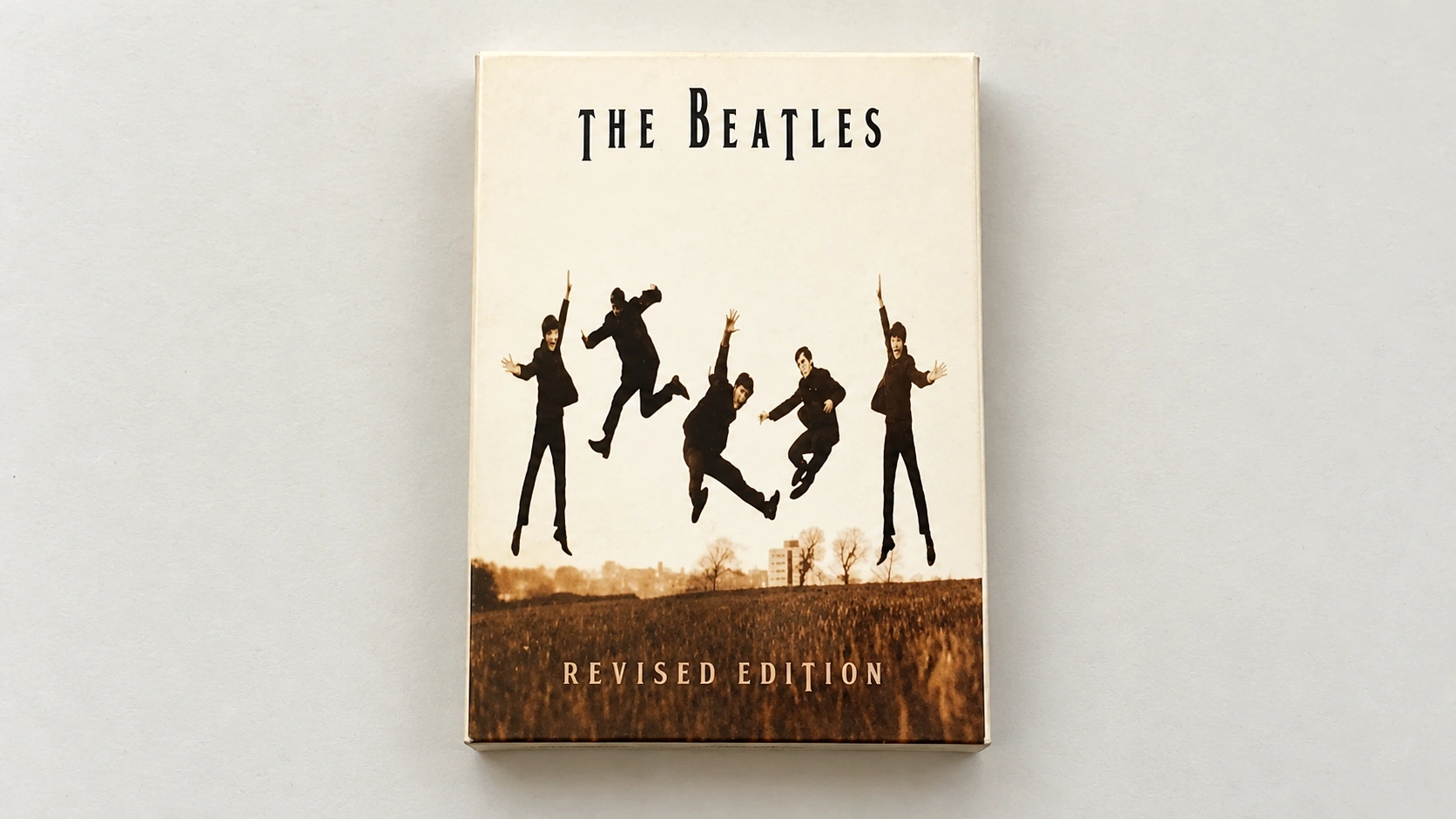 Editorially generated depiction of the cream revised-edition Beatles Tarot box from the supplied product reference; Etsy listing contents unverified